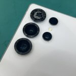 GalaxyS25Ultraのアウトカメラレンズが落下の衝撃で放射状に激しく割れている状態